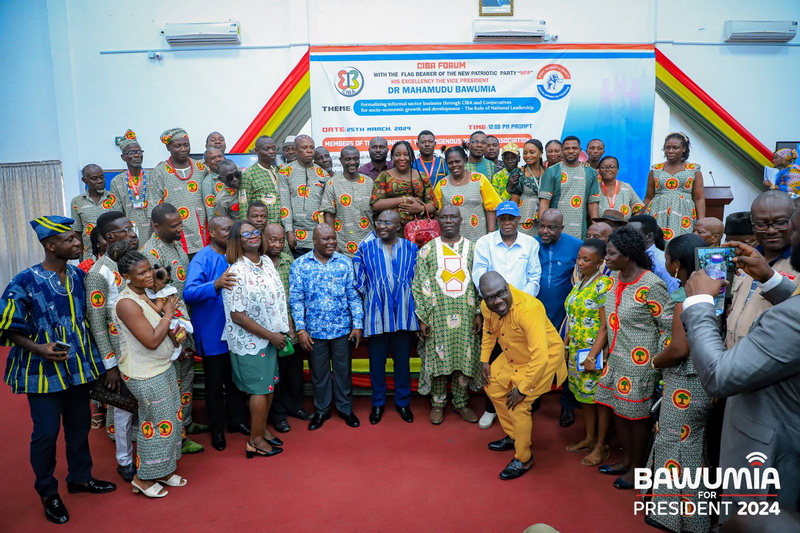 Dr Bawumia with a section of the business community after the meeting