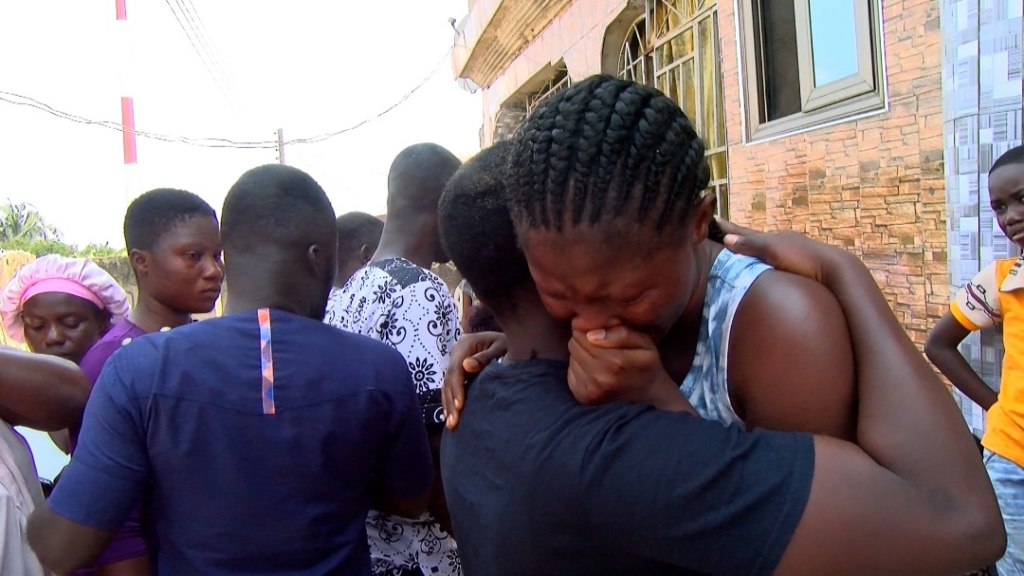 My son was only helping a church member not a relative; mother of 18-year-old fire victim cries
