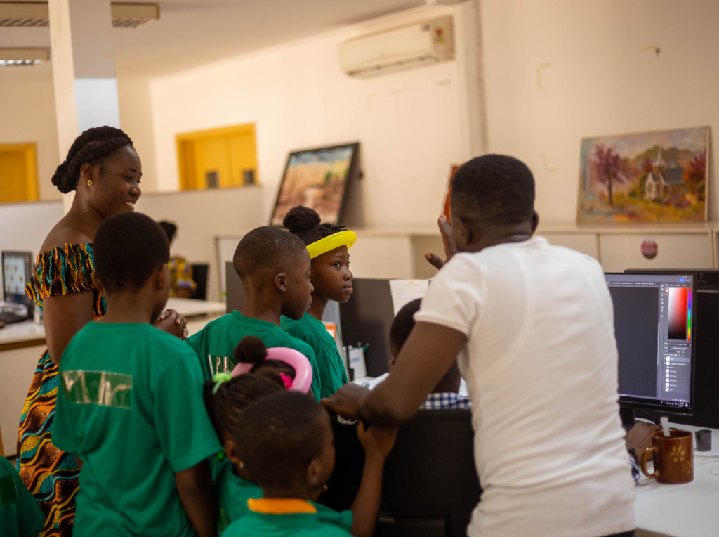 Tex Styles Ghana employees bond with kids at work