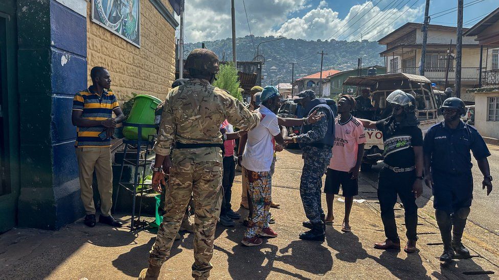 Escaped prisoners are brought back to the Pademba Road Male Correction Centre after being caught by police in Freetown, Sierra Leone,