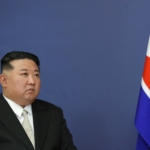 North Korea says it will no longer seek reunification with South Korea, will launch new spy satellites in 2024