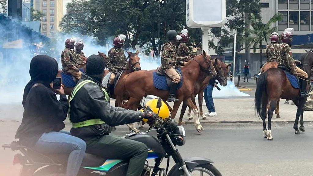 Kenya’s president calls protests ‘treasonous’ after police fire live ...