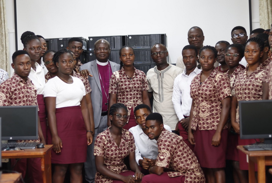 Some students and staff pose with Right Reverend Andam and Mr Baakoe