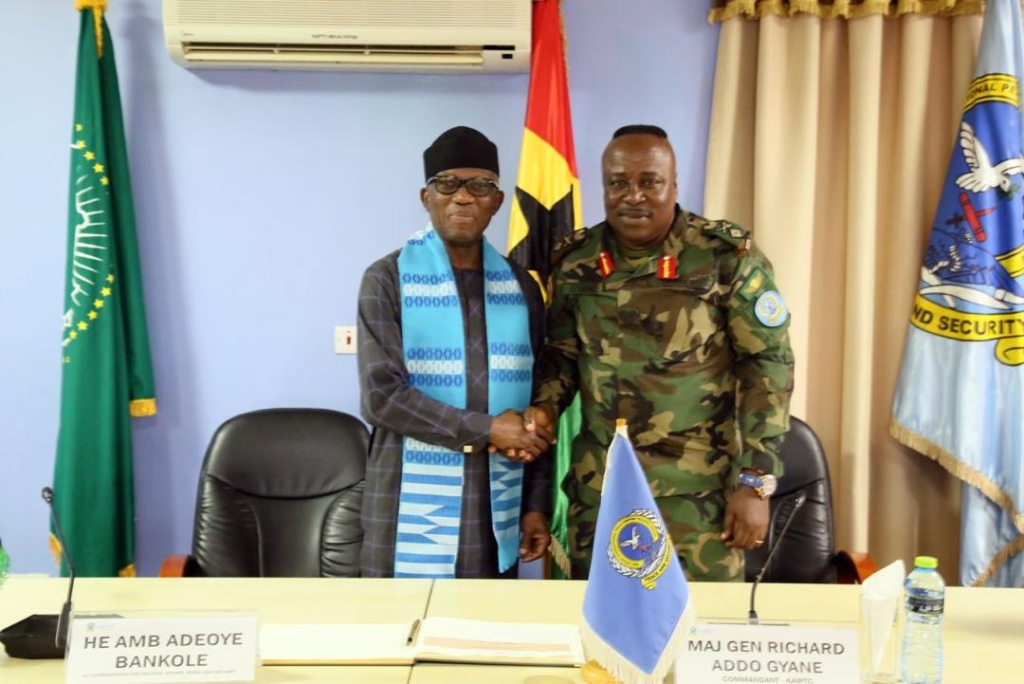 Major General Gyane (right) in pleasantries with Ambassador Adeoye after the visit