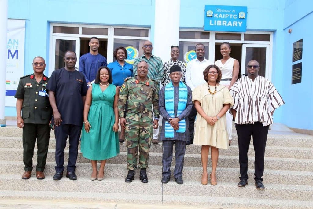 Major General Gyane (middle) and Ambassador Adeoye (3rd from right) and Ambassador William Awinador-Kanyirige, (2nd left), Senior Governance and Peacebuilding Advisor at the AU in a group photo with some management and senior staff of the KAIPTC.