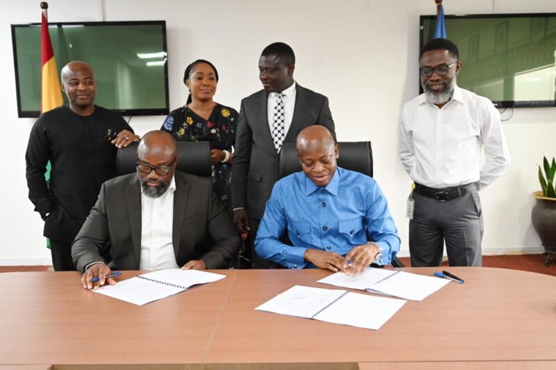 Dr. Daniel McKorley (left) signed on behalf of McDan Group while Michael Achagwe Luguje, Director General of GPHA also signed for GPHA. 