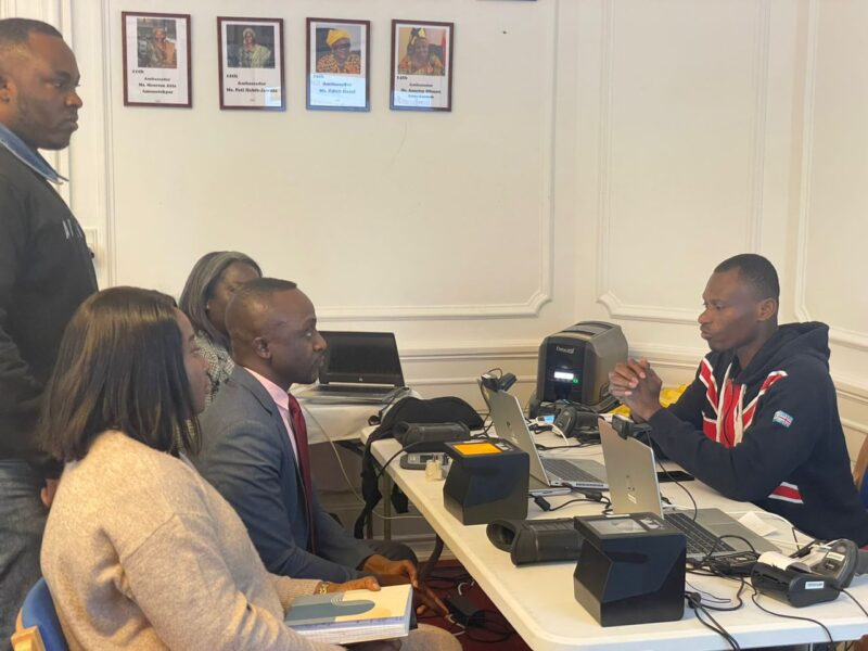 Mr. John Djomaakwei Quaye, a staff at the Ghana Embassy in Denmark going through the registration process