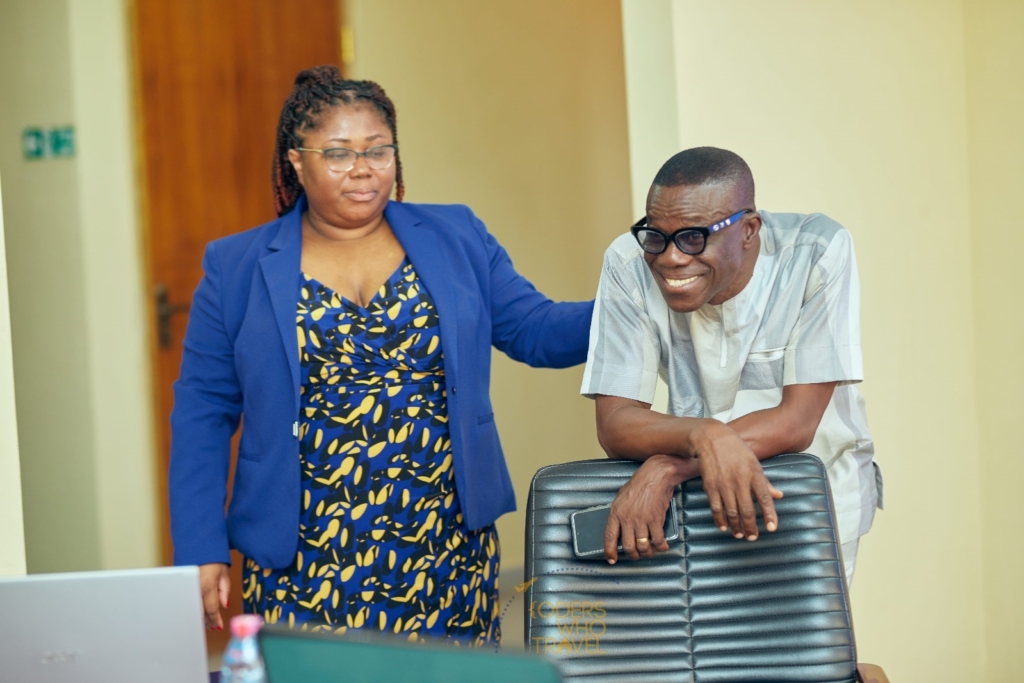 Afia Owusu-Forfie, Founder, Coders Who Travel Inc. with  the Vice-Chancellor of the Catholic University of Ghana, Prof. Daniel Obeng-Ofori